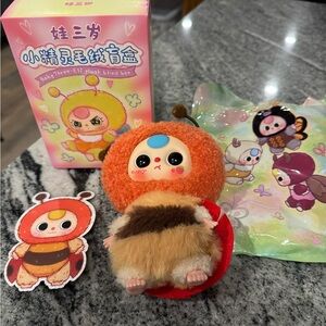 Cute Plush Toy with Orange and Brown Accents